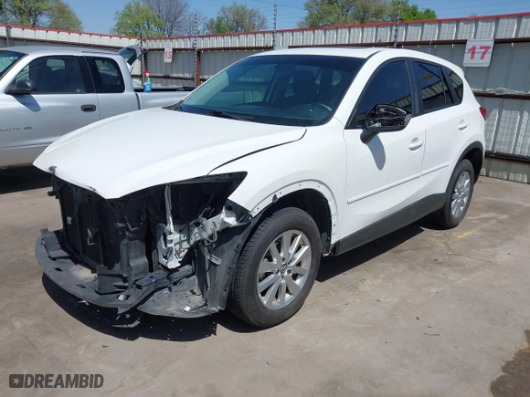 2014 Mazda CX-5 Touring with VIN JM3KE2CY2E0426164, listed as a IAAI auction lot 41812932 with 186,015 mi miles. Bid and sale history available at carsss.com. Image 20.