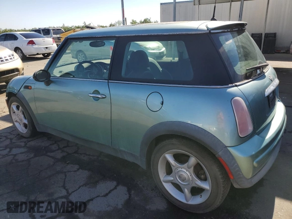 2002 MINI Hardtop with VIN WMWRC33422TE13196, listed as a Copart auction lot 59277643 with 80,501 mi miles and Non Repairable. Bid and sale history available at DreamBid. Image 2.