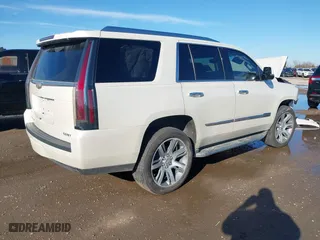 2015 Cadillac Escalade Luxury with VIN 1GYS3MKJXFR651714, listed as a IAAI auction lot 41205449 with 129,066 mi miles. Bid and sale history available at carsss.com. Image 4.
