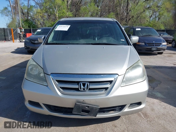 2006 Honda Odyssey EX-L z VIN 5FNRL38786B428264, wystawiony jako IAAI lot #41974479 z przebiegiem 187 595 mil mil oraz . Historia ofert i sprzedaży dostępna na DreamBid. Obrazek 6.