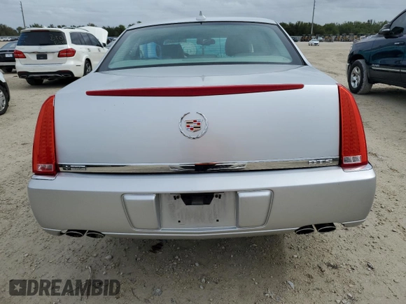 2010 Cadillac DTS 1SA z VIN 1G6KA5EY2AU135849, wystawiony jako Copart lot #79930734 z przebiegiem 98 396 mil mil oraz Nie do naprawy • Non repairable. Historia ofert i sprzedaży dostępna na DreamBid. Obrazek 6.