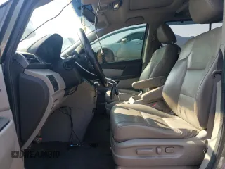 2012 Honda Odyssey Touring with VIN 5FNRL5H90CB505590, listed as a Copart auction lot 62566715 with 323,092 mi miles and Clean title. Bid and sale history available at DreamBid. Image 7.