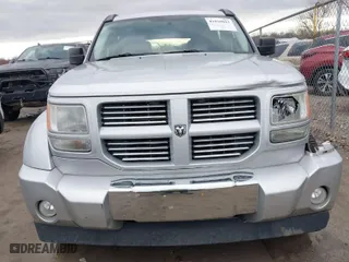 2011 Dodge Nitro Heat with VIN 1D4PU4GK6BW607590, listed as a IAAI auction lot 41810823 with 87,179 mi miles. Bid and sale history available at carsss.com. Image 12.