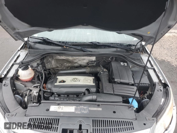 2011 Volkswagen Tiguan SE with VIN WVGBV7AXXBW538750, listed as a Copart auction lot 56604715 with 86,895 mi miles and Salvage title. Bid and sale history available at DreamBid. Image 11.