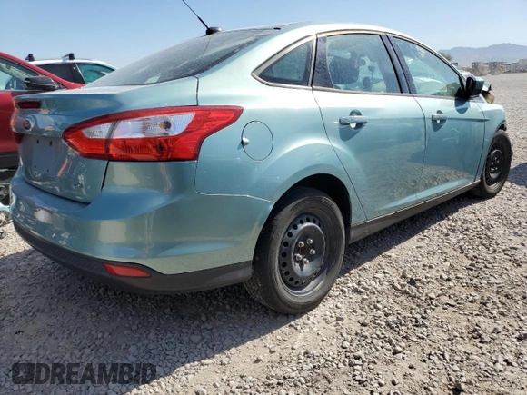 2012 Ford Focus SE with VIN 1FAHP3F24CL163896, listed as a Copart auction lot 61651015 with Not provided miles and Salvage title. Bid and sale history available at DreamBid. Image 3.