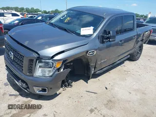 2017 Nissan Titan SV z VIN 1N6AA1E55HN551578, wystawiony jako IAAI lot #42392063 z przebiegiem 123 077 mil mil oraz . Historia ofert i sprzedaży dostępna na DreamBid. Obrazek 18.