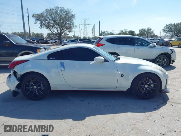 2004 Nissan 350Z Touring with VIN JN1AZ34E74T064156, listed as a IAAI auction lot 41498213 with 148,370 mi miles. Bid and sale history available at carsss.com. Image 13.