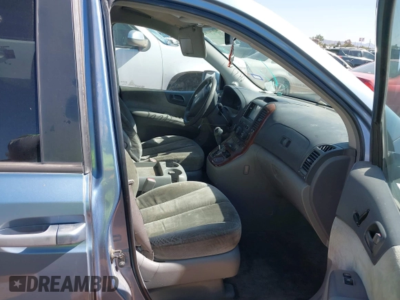 2006 Kia Sedona LX with VIN KNDMB233666054213, listed as a IAAI auction lot 42074176 with 168,080 mi miles. Bid and sale history available at carsss.com. Image 5.