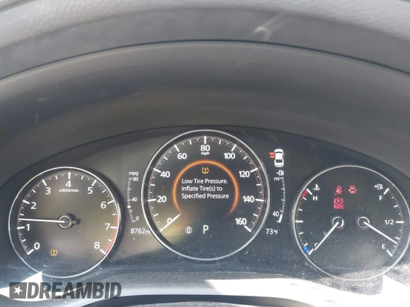 2022 Mazda 3 Carbon Edition with VIN 3MZBPACL0NM318573, listed as a IAAI auction lot 42403393 with 8,762 mi miles and . Bid and sale history available at DreamBid. Image 7.