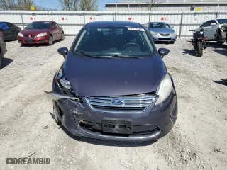 2012 Ford Fiesta SE with VIN 3FADP4BJ7CM157588, listed as a Copart auction lot 52411945 with 124,989 mi miles and Salvage Title. Bid and sale history available at carsss.com. Image 5.