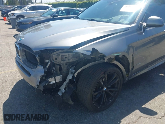 2018 BMW X6 xDrive35i z VIN 5UXKU2C51J0X50913, wystawiony jako IAAI lot #42078443 z przebiegiem Nie podano mil oraz . Historia ofert i sprzedaży dostępna na DreamBid. Obrazek 6.