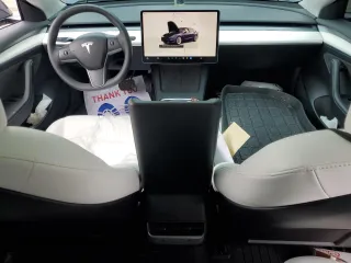 2023 Tesla Model 3 with VIN 5YJ3E1EA1PF678225, listed as a Copart auction lot 62634945 with 24,932 mi miles and Salvage title. Bid and sale history available at DreamBid. Image 8.