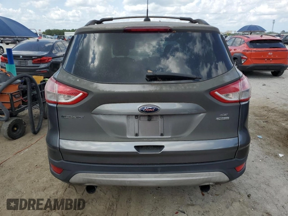 2013 Ford Escape SE with VIN 1FMCU9G9XDUB35233, listed as a Copart auction lot 51359435 with 228,354 mi miles and Clean Title. Bid and sale history available at carsss.com. Image 6.