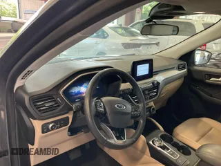 2021 Ford Escape SEL Hybrid z VIN 1FMCU9CZ7MUA83422, wystawiony jako IAAI lot #42743365 z przebiegiem 70 851 mil mil oraz . Historia ofert i sprzedaży dostępna na DreamBid. Obrazek 3.