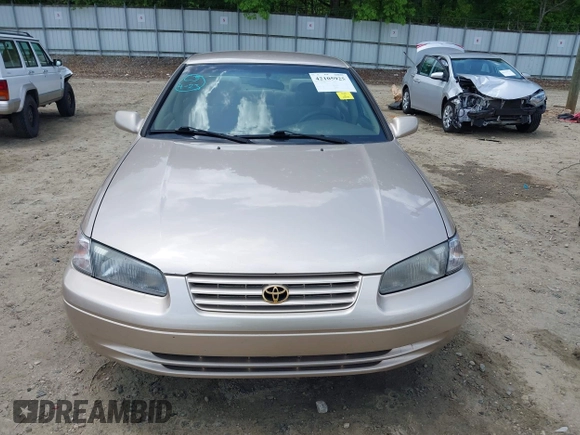 1997 Toyota Camry LE z VIN 4T1BG22K7VU818805, wystawiony jako IAAI lot #42105925 z przebiegiem 140 960 mil mil oraz . Historia ofert i sprzedaży dostępna na DreamBid. Obrazek 12.