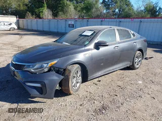2019 Kia Optima LX with VIN 5XXGT4L3XKG292437, listed as a IAAI auction lot 40682048 with 151,012 mi miles. Bid and sale history available at carsss.com. Image 18.