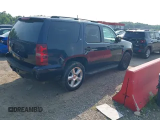 2007 Chevrolet Tahoe LT z VIN 1GNFC13J97J100573, wystawiony jako IAAI lot #42450311 z przebiegiem 234 099 mil mil oraz . Historia ofert i sprzedaży dostępna na DreamBid. Obrazek 4.