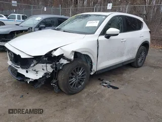 2020 Mazda CX-5 Touring with VIN JM3KFBCM5L1737640, listed as a IAAI auction lot 41613576 with 1 mi miles. Bid and sale history available at carsss.com. Image 2.