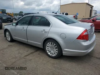 2010 Ford Fusion Hybrid with VIN 3FADP0L33AR140229, listed as a Copart auction lot 63084475 with 164,313 mi miles and Salvage title. Bid and sale history available at DreamBid. Image 2.