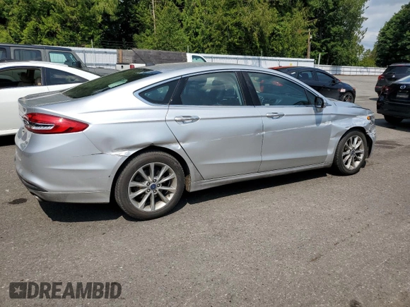 2017 Ford Fusion SE with VIN 3FA6P0HD4HR187841, listed as a Copart auction lot 61766415 with 74,303 mi miles and Salvage title. Bid and sale history available at DreamBid. Image 3.