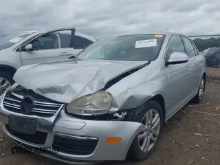 2007 Volkswagen Jetta Wolfsburg Edition z VIN 3VWEF71K77M166713, wystawiony jako IAAI lot #42746458 z przebiegiem 214 241 mil mil oraz . Historia ofert i sprzedaży dostępna na DreamBid. Obrazek 2.