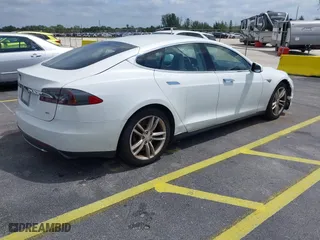 2013 Tesla Model S with VIN 5YJSA1CN2DFP17316, listed as a IAAI auction lot 42092751 with 1 mi miles. Bid and sale history available at carsss.com. Image 4.