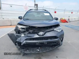 2017 Toyota RAV4 SE with VIN JTMJFREV5HJ155712, listed as a IAAI auction lot 42613998 with 72,112 mi miles and . Bid and sale history available at DreamBid. Image 12.
