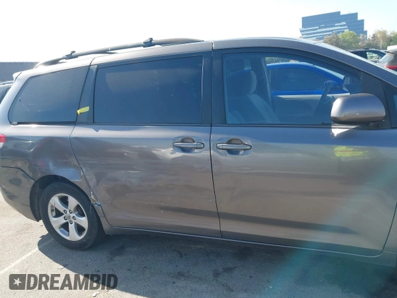 2014 Toyota Sienna LE AAS with VIN 5TDKK3DC6ES521706, listed as a IAAI auction lot 41999188 with 104,867 mi miles. Bid and sale history available at carsss.com. Image 13.