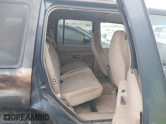 2000 Ford Explorer XLS z VIN 1FMZU62X7YZB81285, wystawiony jako IAAI lot #42720506 z przebiegiem 92 852 mil mil oraz . Historia ofert i sprzedaży dostępna na DreamBid. Obrazek 8.