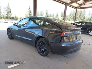 2025 Tesla Model 3 Long Range with VIN 5YJ3E1EA1SF923548, listed as a IAAI auction lot 42046257 with 3,979 mi miles and . Bid and sale history available at carsss.com. Image 3.