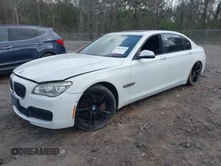 2015 BMW 7 Series 750Li with VIN WBAYE8C54FD780951, listed as a IAAI auction lot 41813038 with 103,131 mi miles. Bid and sale history available at carsss.com. Image 2.