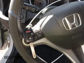 2012 Honda Fit Sport with VIN JHMGE8H51CC041804, listed as a IAAI auction lot 41772371 with 138,116 mi miles and . Bid and sale history available at DreamBid. Image 11.