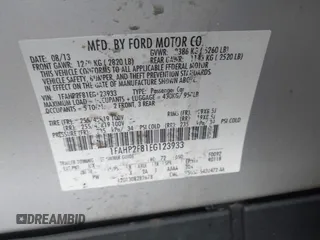 2014 Ford Taurus Limited with VIN 1FAHP2F81EG123933, listed as a IAAI auction lot 41843301 with 111,629 mi miles. Bid and sale history available at carsss.com. Image 9.