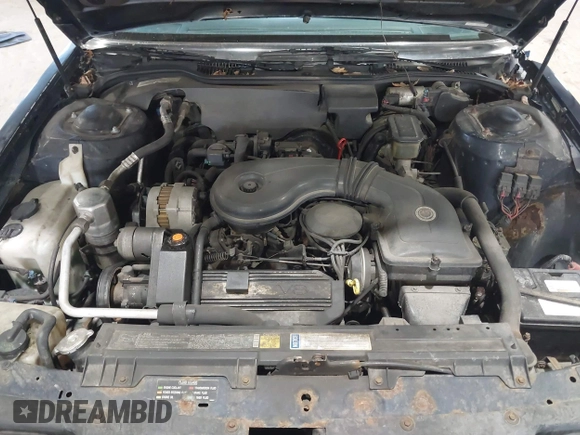 1989 Cadillac DeVille z VIN 1G6CD5159K4356924, wystawiony jako IAAI lot #41526057 z przebiegiem 148 134 mil mil oraz . Historia ofert i sprzedaży dostępna na DreamBid. Obrazek 10.