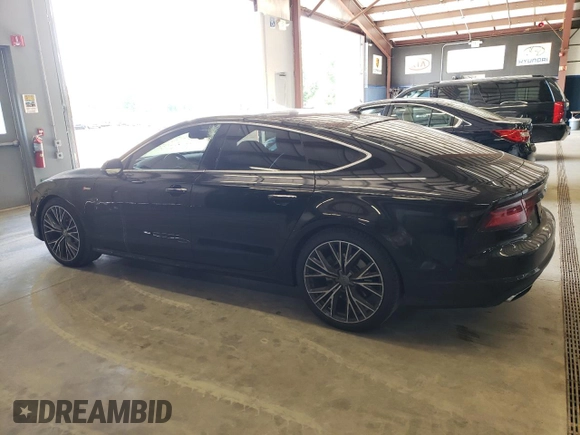 2016 Audi A7 3.0 Premium Plus with VIN WAUWGAFC5GN064672, listed as a Copart auction lot 71574044 with 64,927 mi miles and Salvage Title. Bid and sale history available at carsss.com. Image 2.
