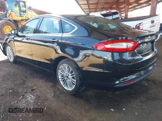 2014 Ford Fusion SE Hybrid with VIN 3FA6P0LUXER291754, listed as a IAAI auction lot 42415936 with 154,474 mi miles and . Bid and sale history available at DreamBid. Image 3.