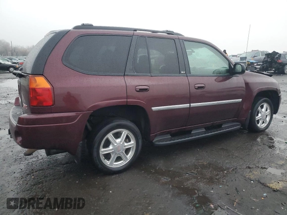 2007 GMC Envoy SLE with VIN 1GKDT13S372265140, listed as a Copart auction lot 84198914 with 256,650 mi miles and Salvage Title. Bid and sale history available at carsss.com. Image 3.