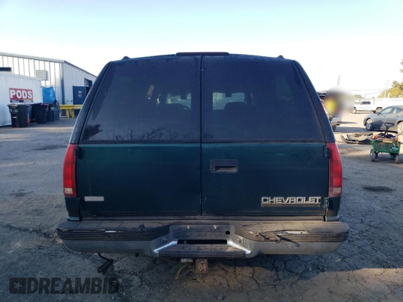 1997 Chevrolet Suburban with VIN 3GNEC16R6VG167319, listed as a Copart auction lot 77485194 with 188,479 mi miles and Salvage Title. Bid and sale history available at carsss.com. Image 6.