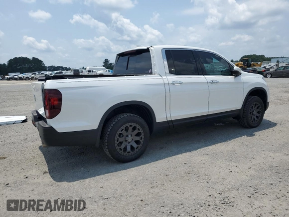 2023 Honda Ridgeline RTL-E with VIN 5FPYK3F7XPB027874, listed as a Copart auction lot 63771315 with 11,945 mi miles and Salvage title. Bid and sale history available at DreamBid. Image 3.