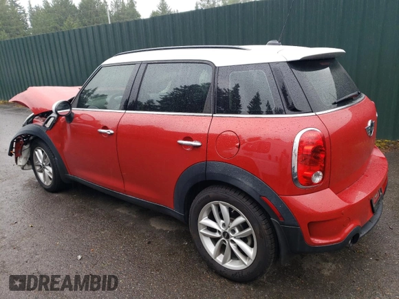 2014 MINI Countryman S with VIN WMWZC3C52EWP25379, listed as a Copart auction lot 61438355 with 76,943 mi miles and Salvage title. Bid and sale history available at DreamBid. Image 2.