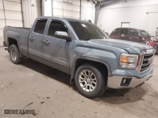 2015 GMC Sierra 1500 SLE with VIN 1GTV2UECXFZ285403, listed as a IAAI auction lot 41255076 with 71,498 mi miles. Bid and sale history available at carsss.com. Image 1.