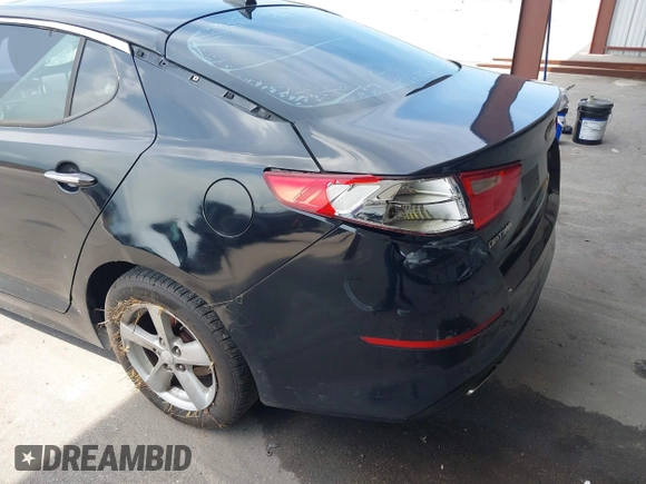 2014 Kia Optima LX z VIN 5XXGM4A77EG322243, wystawiony jako IAAI lot #42334987 z przebiegiem 141 068 mil mil oraz . Historia ofert i sprzedaży dostępna na DreamBid. Obrazek 14.