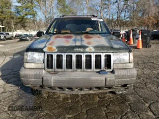 1996 Jeep Grand Cherokee with VIN 1J4EZ58S9TC148692, listed as a Copart auction lot 87730075 with Not provided miles and Salvage title. Bid and sale history available at DreamBid. Image 5.