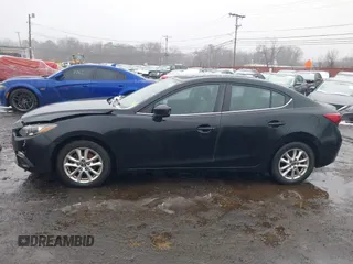 2014 Mazda 3 i Grand Touring with VIN JM1BM1W79E1155302, listed as a IAAI auction lot 41512501 with 98,635 mi miles and . Bid and sale history available at DreamBid. Image 14.