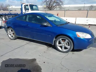 2006 Pontiac G6 GTP with VIN 1G2ZM171164167148, listed as a IAAI auction lot 41597445 with 117,227 mi miles. Bid and sale history available at carsss.com. Image 1.