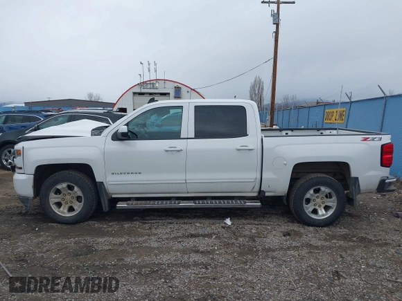 2018 Chevrolet Silverado 1500 LT with VIN 3GCUKREC0JG594914, listed as a IAAI auction lot 41735134 with 98,407 mi miles. Bid and sale history available at carsss.com. Image 14.