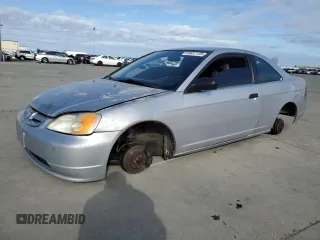 2002 Honda Civic DX with VIN 1HGEM22212L020068, listed as a Copart auction lot 50657135 with Not Provided miles and Salvage Title. Bid and sale history available at DreamBid. Image 1.