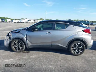 2019 Toyota C-HR XLE with VIN NMTKHMBX4KR082574, listed as a IAAI auction lot 41694921 with 61,777 mi miles and . Bid and sale history available at DreamBid. Image 14.