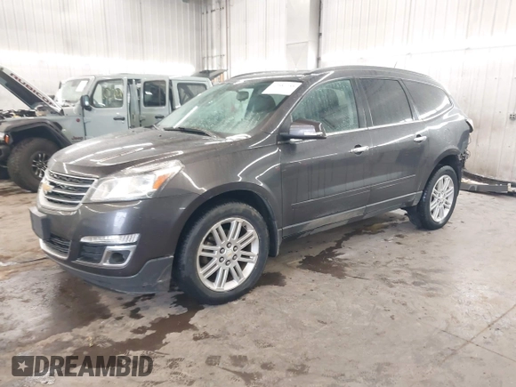 2015 Chevrolet Traverse LT with VIN 1GNKVGKD5FJ296064, listed as a IAAI auction lot 42581755 with 162,297 mi miles and . Bid and sale history available at DreamBid. Image 2.