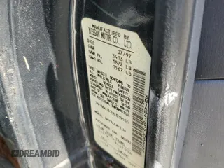 1997 Nissan Sentra XE z VIN 3N1AB41D3VL035555, wystawiony jako Copart lot #76200984 z przebiegiem 166 012 mil mil oraz Szkoda całkowita • Salvage title. Historia ofert i sprzedaży dostępna na DreamBid. Obrazek 13.